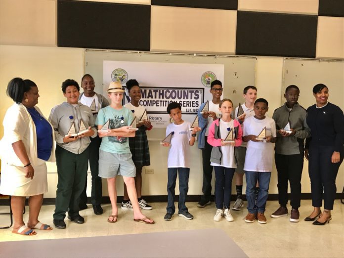 STX MathCounts Top Ten Students with Coordinator & Deputy Commish STX MathCounts Top 10 Students with Coordinator & Deputy Commissioner - From left: STX Math Coordinator Juanita Boneque, Samir Boucenna, Zanyja Rodriguez, Andrew Thompson, Kristina Horsford, Keemar Crosky, Jaden Gonzalez, Lauren Jones, Nick Turk, Aundre Dolcar, Michael Atwell, and Deputy Commissioner Carla Bastian. (Source Photo by Elisa McKay)