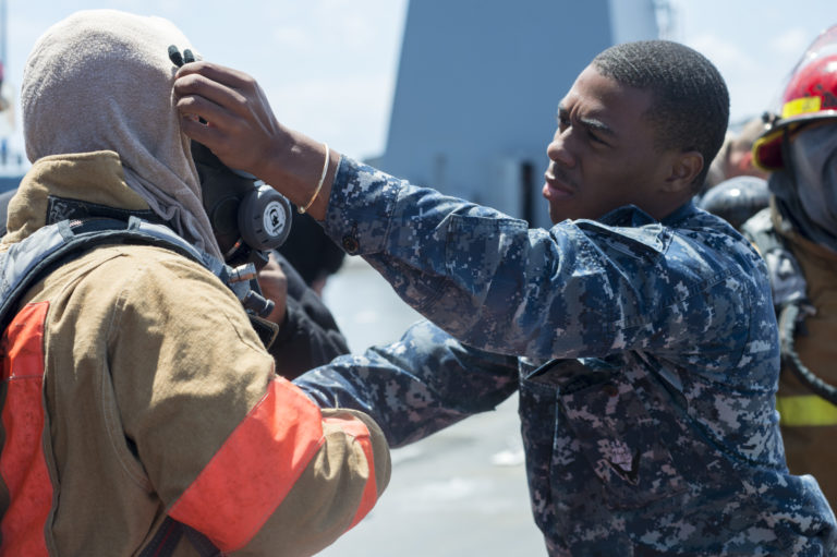Communication Is Key for Navy Technician Sigui M. Howard-Magras