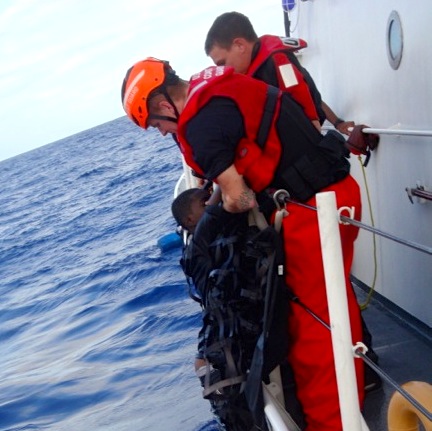 Coast Guard Rescues Two Migrants Thrown from Smugglers' Ship