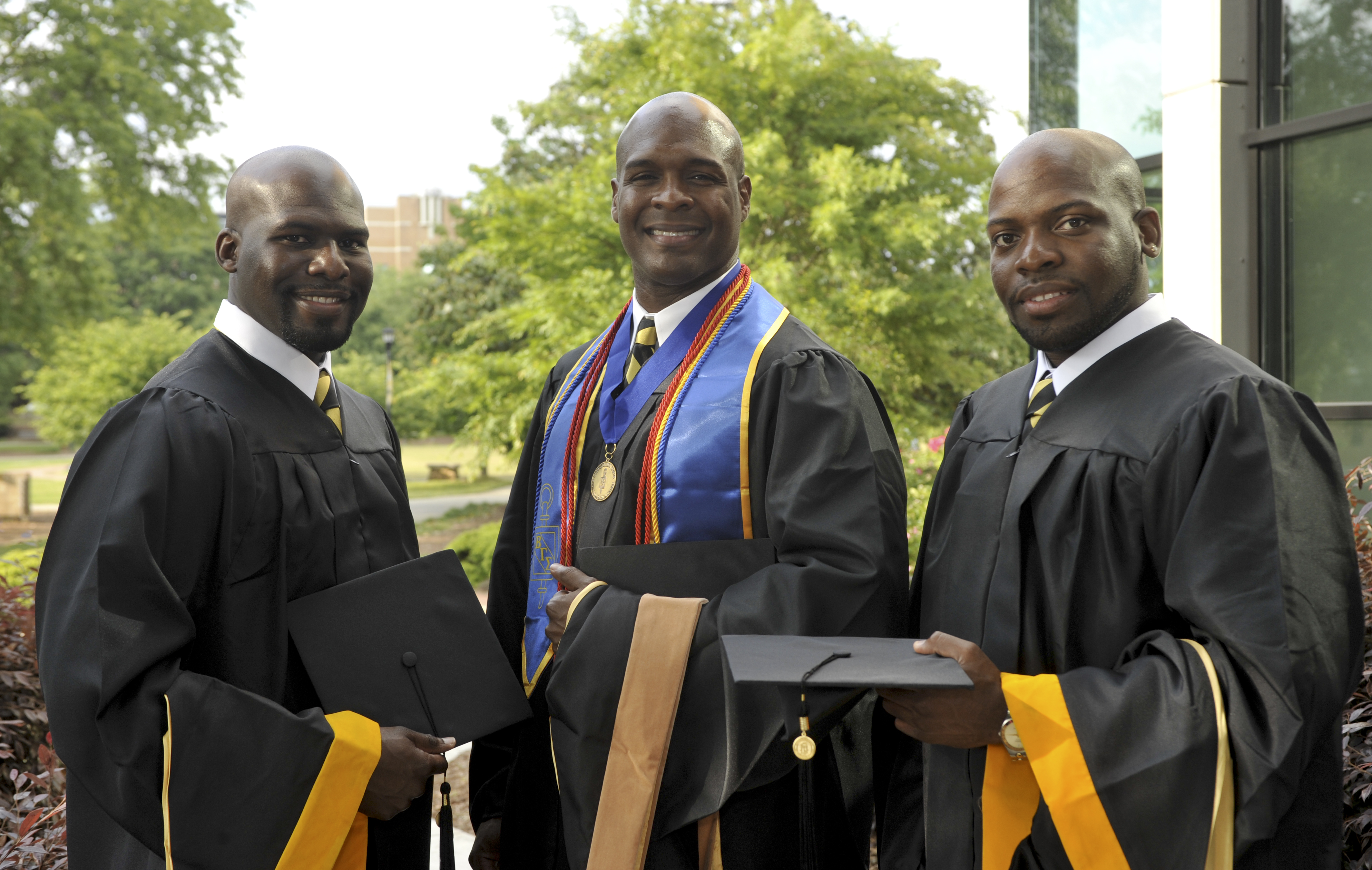 Three Brothers Earn Master's Degrees at Same University on the Same Day