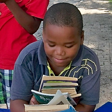 Rotarians Give Away Books in Frederiksted